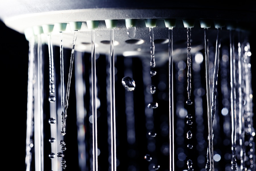 shower water drops on black background.