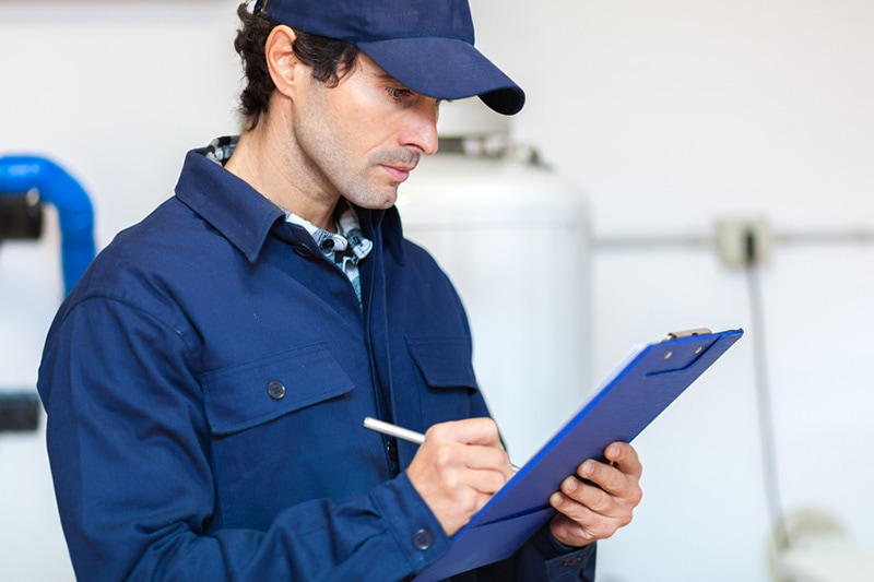 man performing furnace maintenance in Weiser, ID