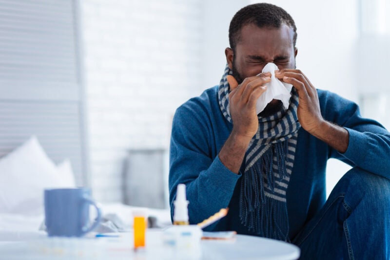 someone sneezing because of seasonal allergies in Weiser