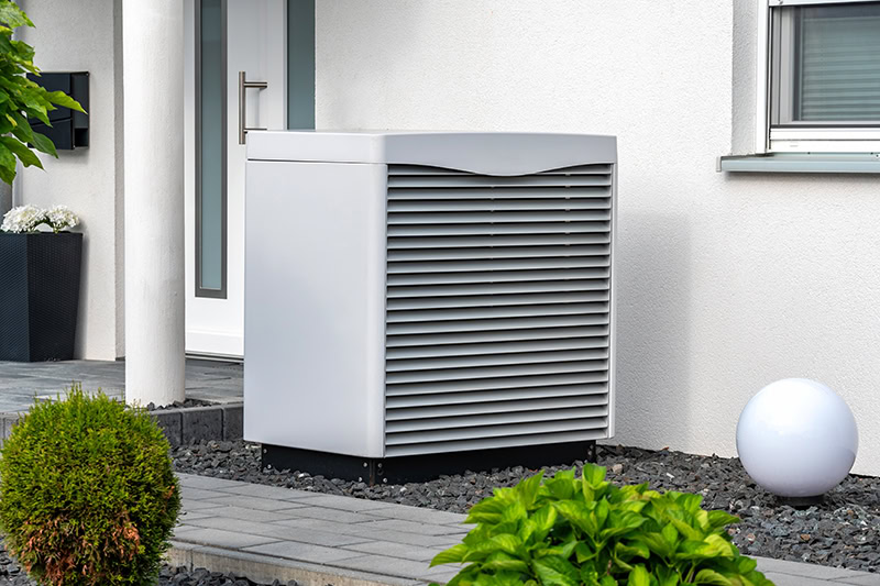 Outdoor condensing unit for a residential heat pump.