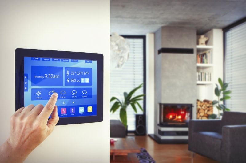 MSC_B_007-iStock-934672818-1 Zone Your Way to Comfort. Person using home automation to control lighting